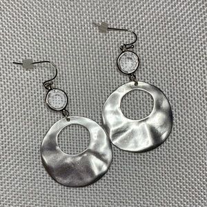 Brushed silver metal drop earrings.